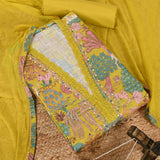 Catchy Yellow Bagh Print Cotton Unstitched Suit Set